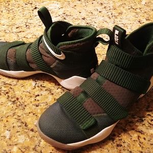 Men's size 10.5 Nike Green basketball high tops.